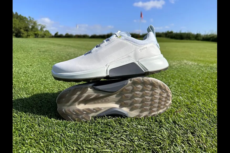 Golf shoes with soft spikes provide stability and grip without damaging the greens. Golf shoes with soft spikes provide stability and grip without damaging the greens.