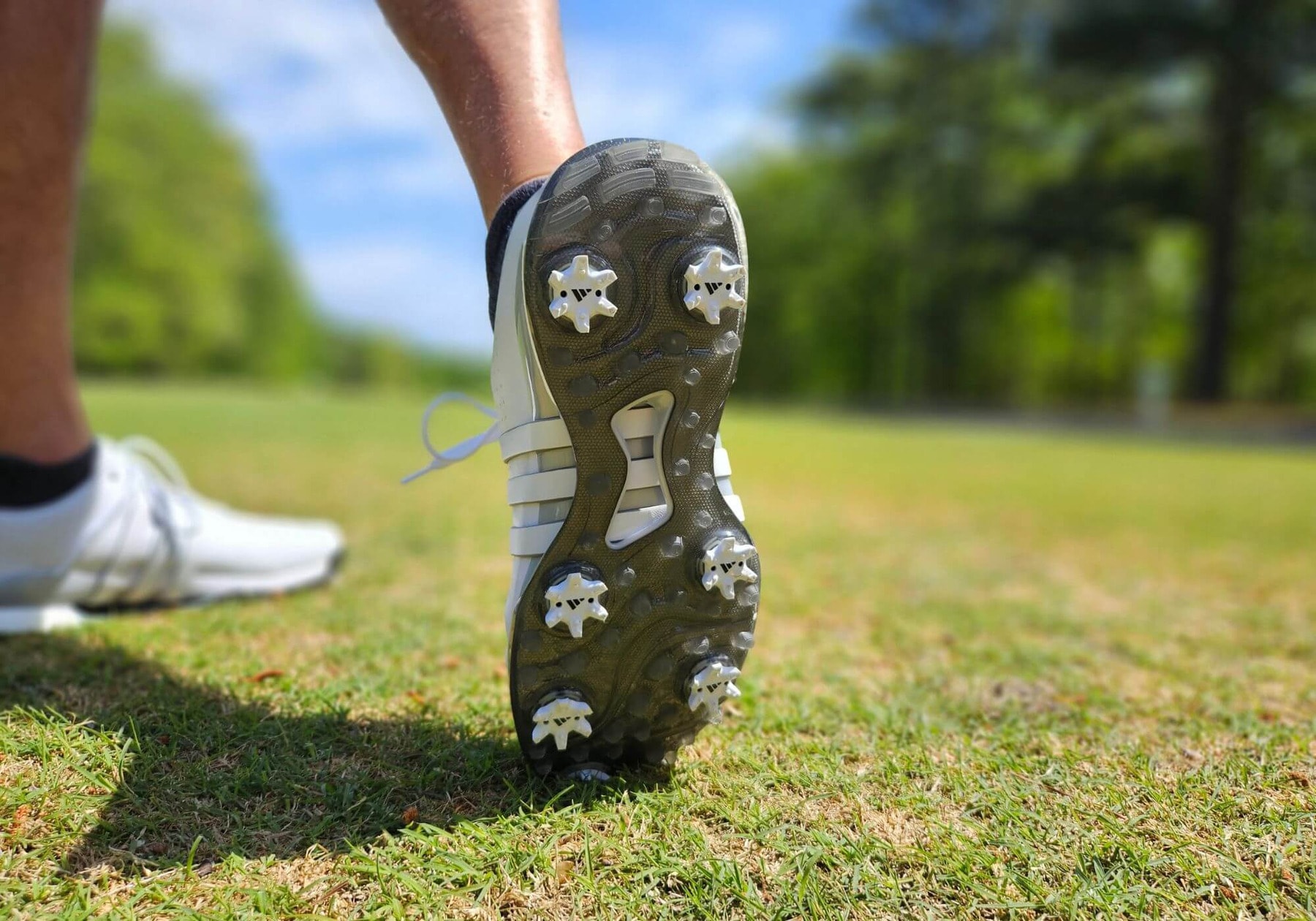 Spiked golf shoes feature cleats for maximum grip and stability on grass, making them ideal for on-course performance. Spiked golf shoes feature cleats for maximum grip and stability on grass, making them ideal for on-course performance.