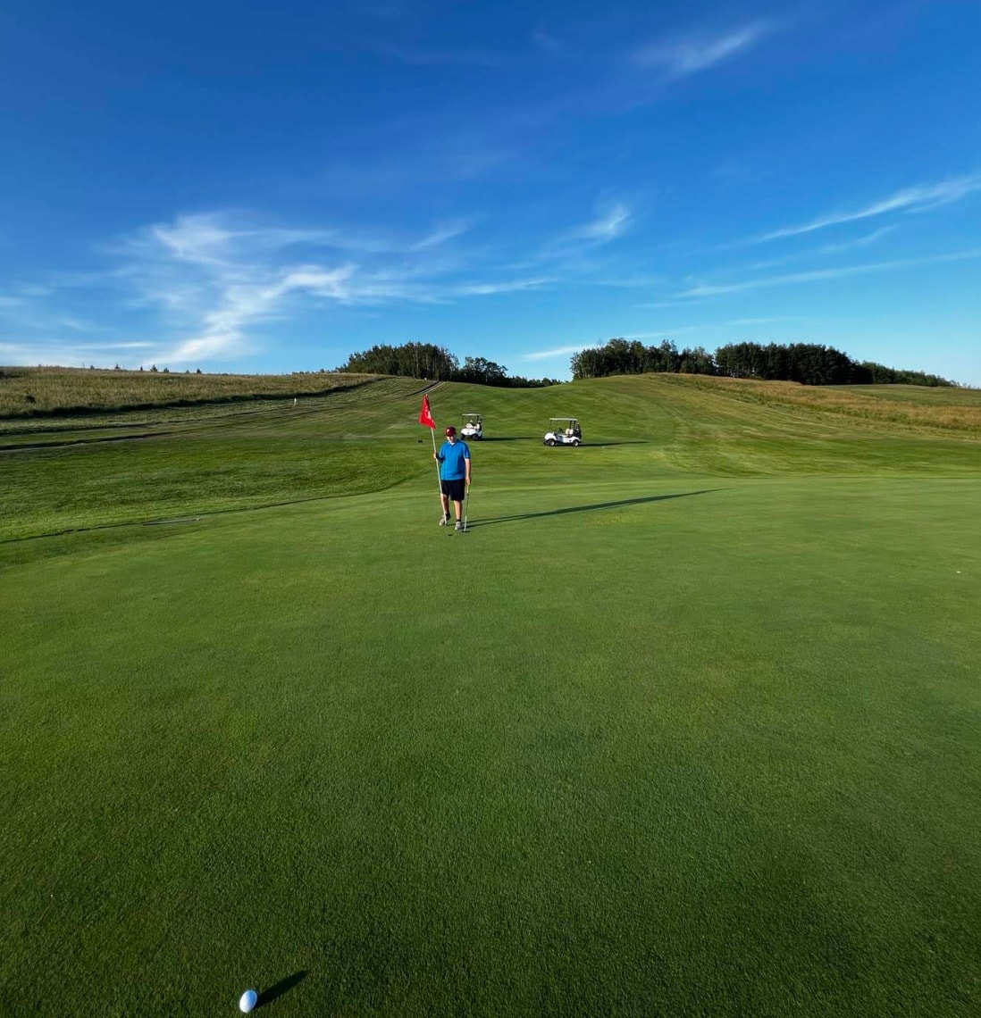 Golfer lines up a putt under clear skies at Greenhills Golf Resort in Greenwater Lake Provincial Park. Golfer lines up a putt under clear skies at Greenhills Golf Resort in Greenwater Lake Provincial Park.