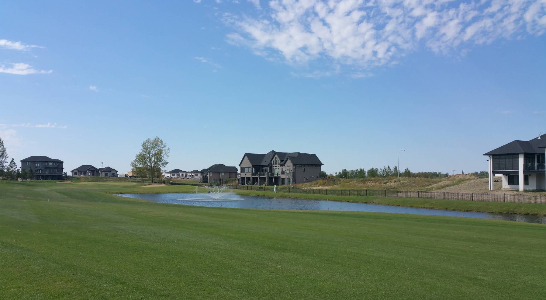 Modern homes line the fairways around a tranquil pond at Greenbryre Golf & Country Club in Saskatoon. Modern homes line the fairways around a tranquil pond at Greenbryre Golf & Country Club in Saskatoon.