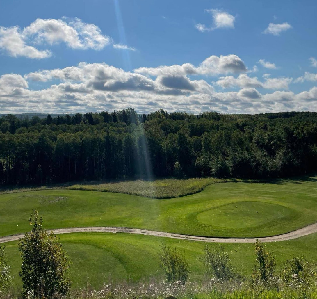 Morning light spills over the rolling greens and forest backdrop at Greenhills Golf Resort in Greenwater Lake Provincial Park. Morning light spills over the rolling greens and forest backdrop at Greenhills Golf Resort in Greenwater Lake Provincial Park.