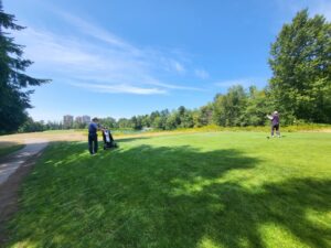 Teeing off under blue skies at Langara—peaceful vibes, friendly pace, and plenty of room to swing.