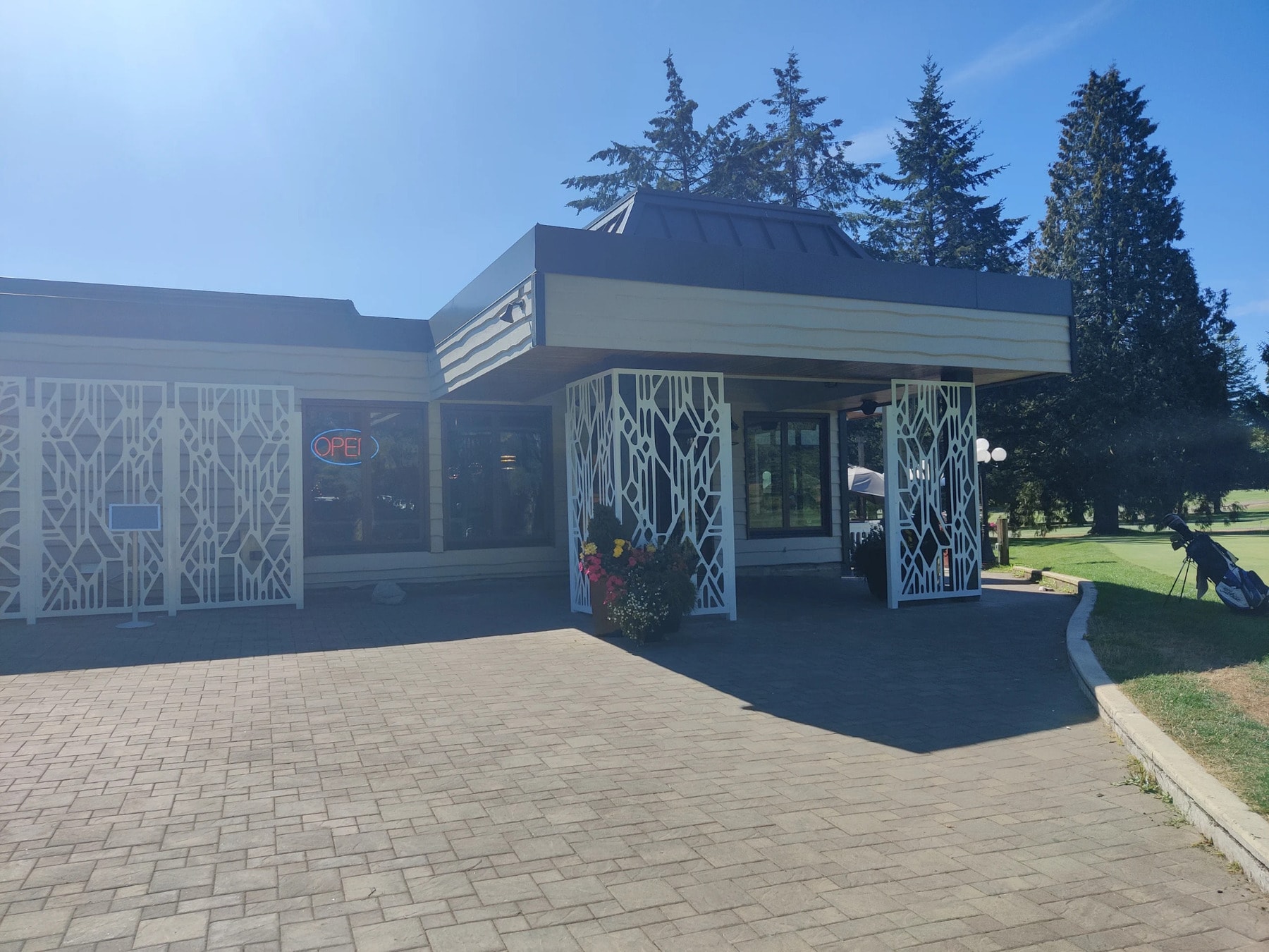 The clubhouse entrance at Burnaby Mountain - open, welcoming, and ready for golfers grabbing a bite or checking in. The clubhouse entrance at Burnaby Mountain - open, welcoming, and ready for golfers grabbing a bite or checking in.