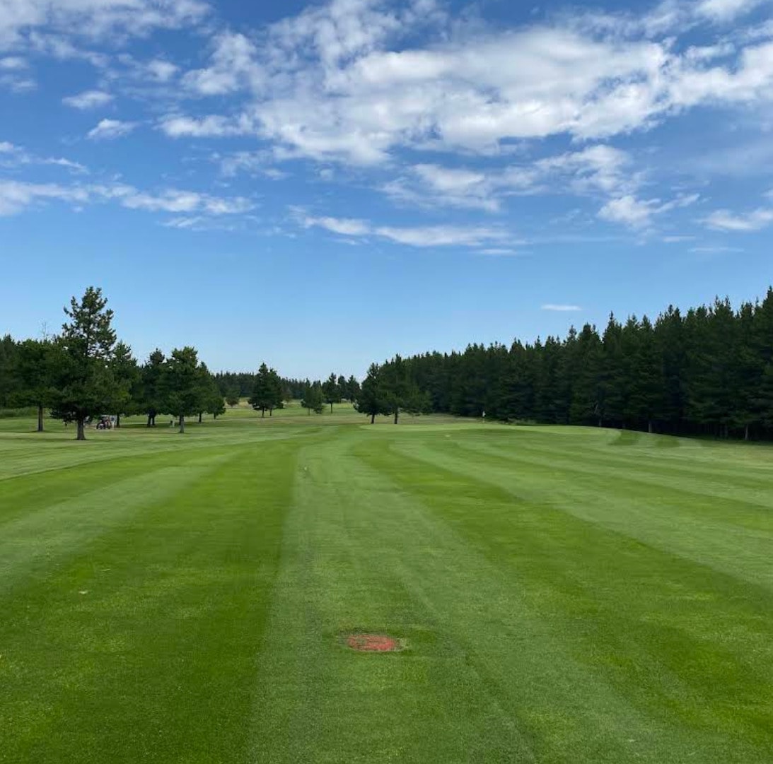 Wide fairways and tall evergreens line the scenic Cypress Hills Golf Course at Centre Block, offering a peaceful round amid the park’s rolling highlan Wide fairways and tall evergreens line the scenic Cypress Hills Golf Course at Centre Block, offering a peaceful round amid the park’s rolling highlan